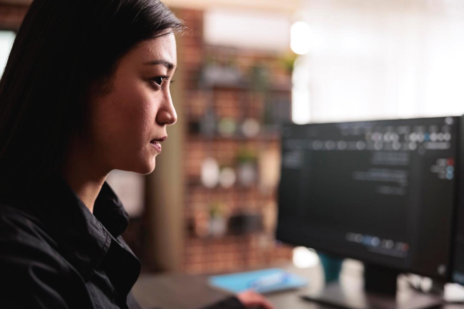 Mobile app development workspace showing code review and testing process